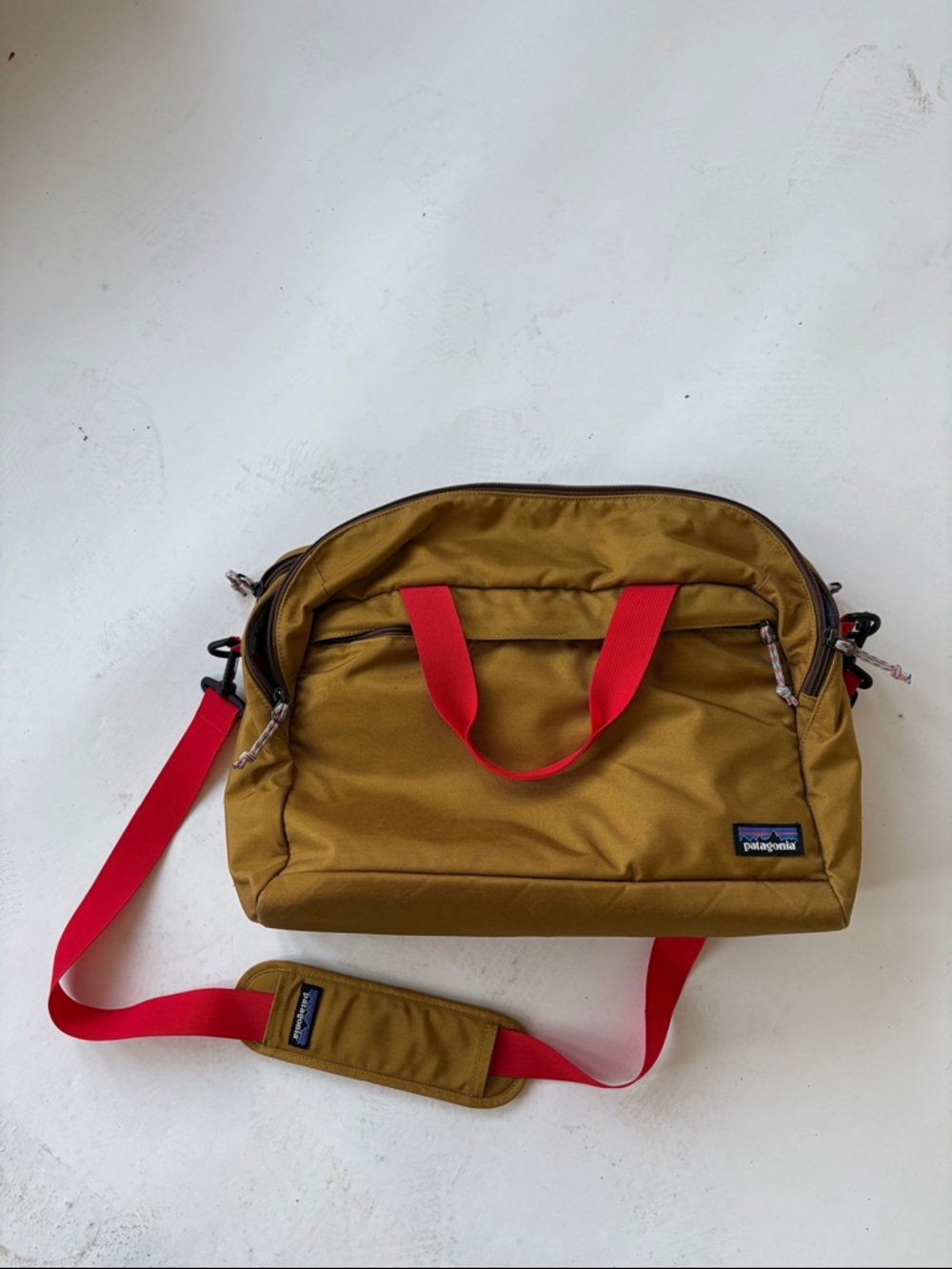 Patagonia laptop Bag in Mustard with Red Straps